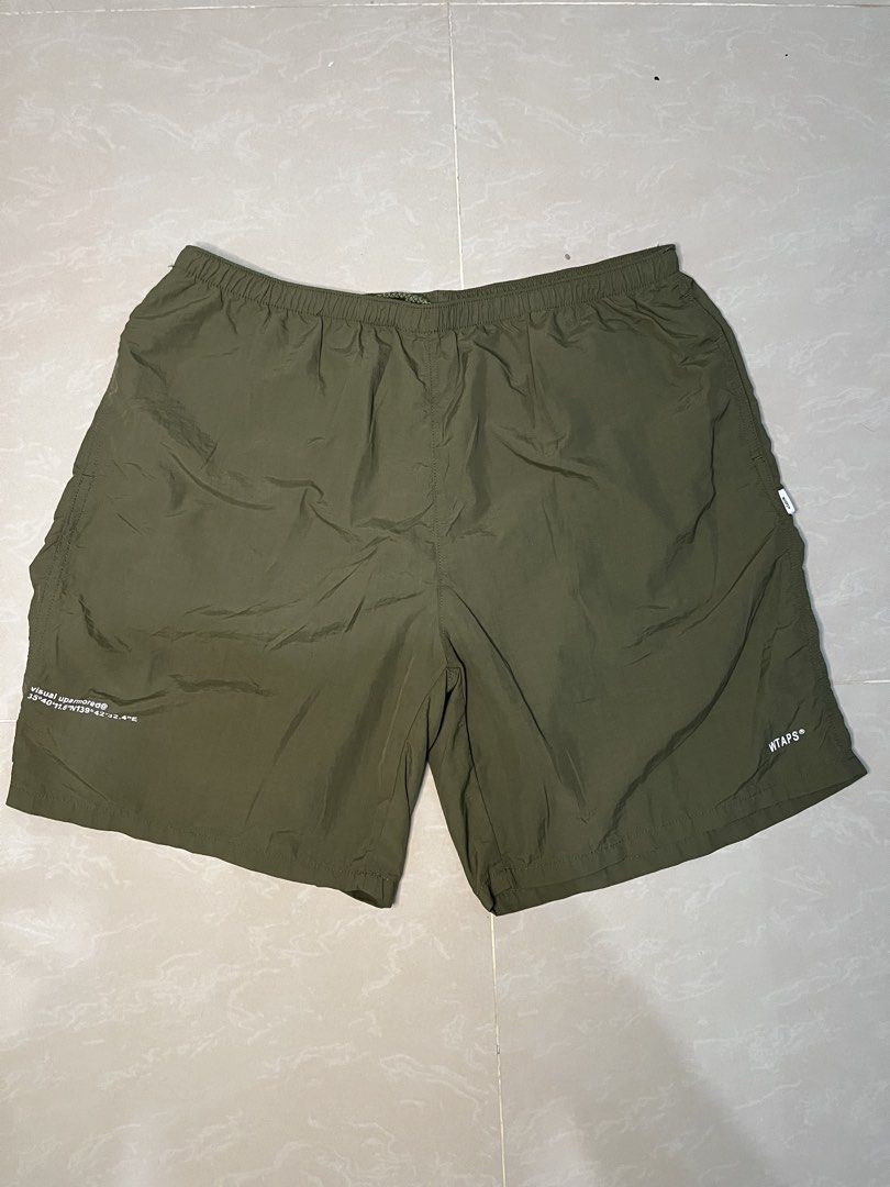 WTAPS olive green shorts (Category: Shorts) located in Quezon City. Submitted by stickyoww (Listing ID 1470268021, Image 1). Description: WTAPS olive green shorts W 33 L 20 Stretchable waist Excellent condition No issue QC location .