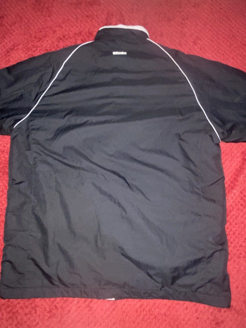 X-united Black Fleece-Lined Windbreaker Jacket (Category: Coats, Jackets and Outerwear) located in Manila. Submitted by almazankyle19 (Listing ID 1470172480, Image 2). Description: - Brand: X-united - Color: Black with white piping details - Size: Large (Measures 23" x 28") - Interior: Soft fleece lining for extra warmth - Pockets: Convenient zippered chest and side pockets - Closure: Full front zip - Condition: Clean inside and out.