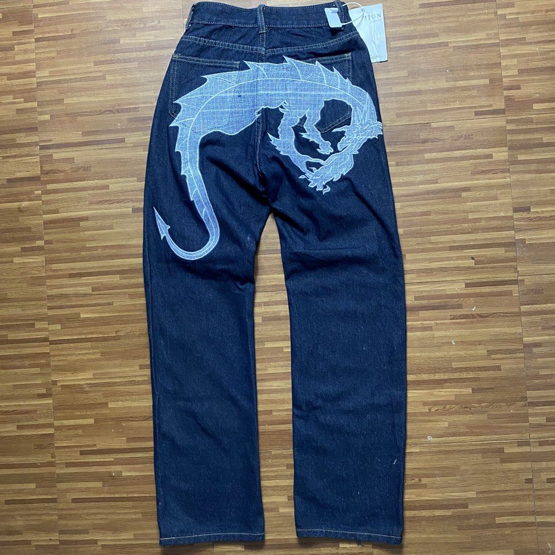 Y2k Dragon embroidery pants (Category: Jeans) located in Quezon City. Submitted by semantaryrave (Listing ID 1470304667, Image 1). Description: Y2k Dragon embroidery pants Size- 26 Waist- 26 Length- 41 Thigh- 10 Hem- 8 Good Conditions No issue Dm purchase .