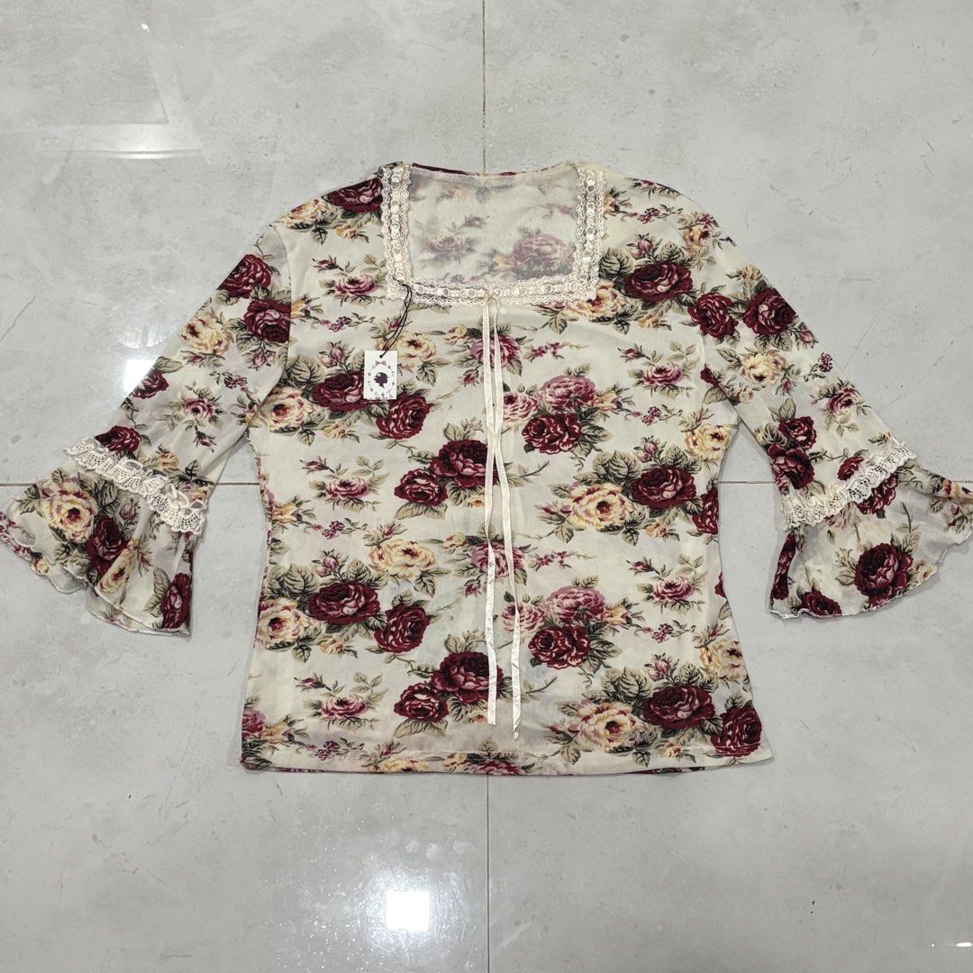 Y2k floral mesh long sleeve (Category: Longsleeves) located in Cebu City. Submitted by florianmiral28 (Listing ID 1470299576, Image 1). Description: Y2k floral mesh long sleeve Excellent condition Medium W 18.5 L 23.
