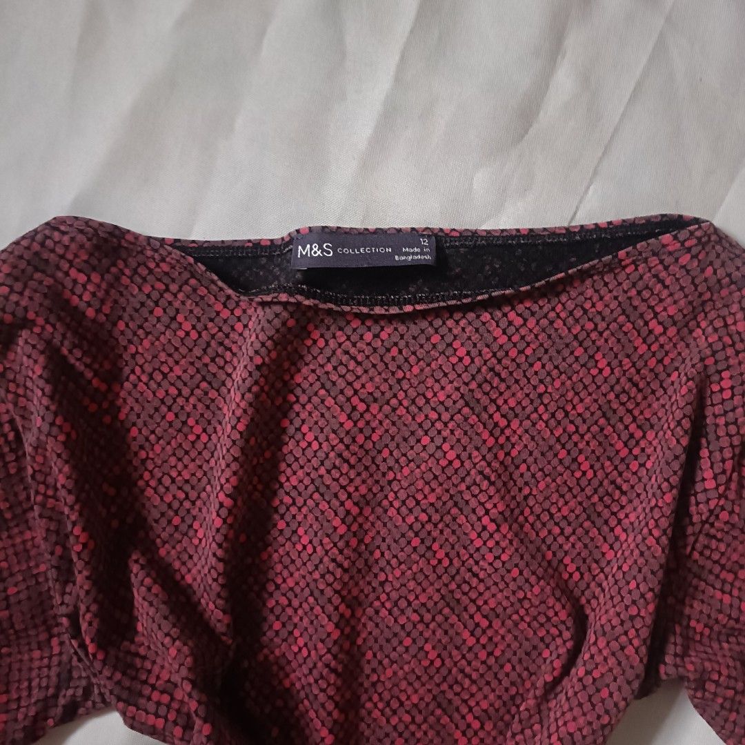 Y2k M&S Collection Long Sleeve Red Pattern Top Size 12 (Category: Longsleeves) located in Valenzuela. Submitted by thrifty_loser88 (Listing ID 1470248935, Image 2). Description: - Brand: M&S Collection - Size: 12 (tag attached) - Color: Red with a textured snake/dot print - Design: Long sleeves and elegant boat neckline - Origin: Made in Bangladesh - Condition/Style: Comfortable everyday top, easy to match with jeans or skirts.
