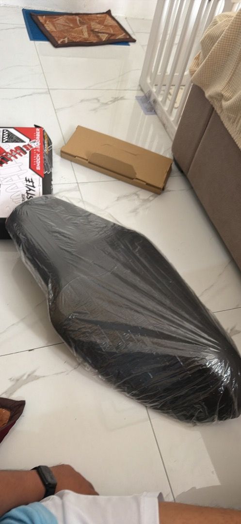 Yamaha Aerox seat v2 (Category: Other Motorcycles Parts and Accessories) located in Caloocan City. Submitted by brightmountain_af2bde (Listing ID 1470200461, Image 1). Description: For sale: original stock seat from Yamaha Aerox V2 (Aerox 155). ✅ Genuine Yamaha, not replica ✅ Used from 2022 until now, one owner ✅ [No tears / no rips on the cover] ✅ [Foam still firm, comfortable for daily riding] ✅ Base, hinge bracket and lock latch intact ✅ Direc