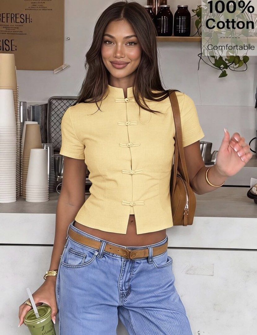 Yellow Chinese Collar Short Sleeve Top (Category: Blouses) located in Mandaluyong City. Submitted by prettyfindsbyb (Listing ID 1470289239, Image 1). Description: - DM for WW! - Color: Bright yellow - Material: 100% comfortable cotton with a slight textured weave - Design: Mandarin collar, traditional frog knot button closures, and a small split hem - Fit: Fitted silhouette with short sleeves - Styling: Versatile piece that pairs easily with high