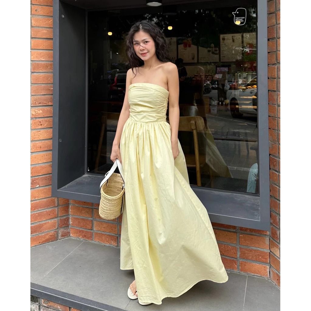 Yellow strapless long maxi dress (Category: Dresses) located in Manila. Submitted by amaze.exe (Listing ID 1470169367, Image 1). Description: - Color: Pastel yellow - Style: Strapless bandeau neckline with a fitted ruched bodice and flared floor-length skirt - Material: Lightweight woven fabric - Occasion: Ideal for weekend outings or summer holidays - Bought from Thailand, wore Once..