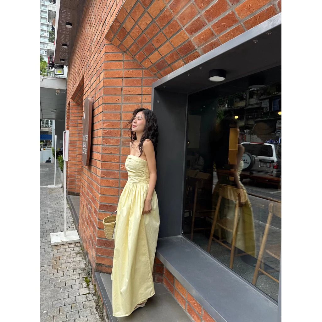 Yellow strapless long maxi dress (Category: Dresses) located in Manila. Submitted by amaze.exe (Listing ID 1470169367, Image 2). Description: - Color: Pastel yellow - Style: Strapless bandeau neckline with a fitted ruched bodice and flared floor-length skirt - Material: Lightweight woven fabric - Occasion: Ideal for weekend outings or summer holidays - Bought from Thailand, wore Once..