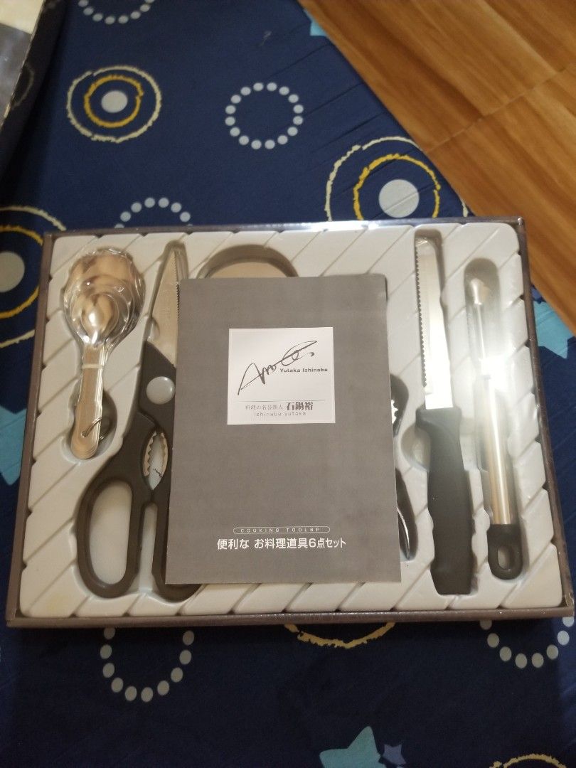 Yutaka Ishinabe Cooking Tool 6-Piece Set (Category: Cookware & Accessories) located in Paranaque City. Submitted by m4rkjulius07672 (Listing ID 1470203899, Image 2). Description: - Brand: Yutaka Ishinabe (6-Piece Cooking Tool Set) - Condition: Brand new, never used, in original box with instruction booklet - Material: Durable stainless steel with sleek black handles - Included tools: Multi-purpose scissors, pizza cutter, peeler, cheese knife, cor