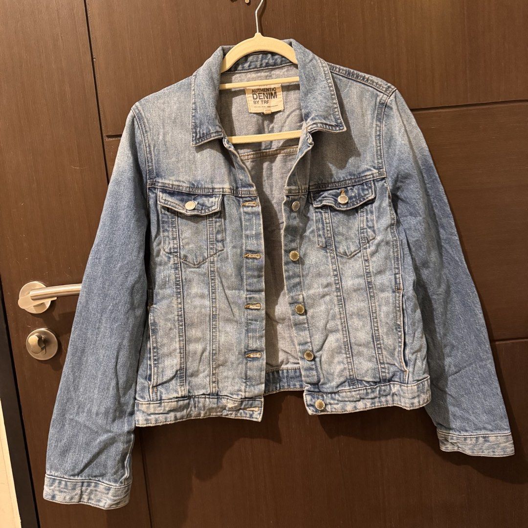 Zara Authentic Denim by TRF Jacket (Category: Coats, Jackets and Outerwear) located in Quezon City. Submitted by ianne.declutter (Listing ID 1470176679, Image 2). Description: - Brand: Zara TRF - Wash: Light wash denim - Closure: Button-up front with metal buttons - Pockets: Functional chest flap pockets - Cuffs: Button cuffs - Style: Classic casual staple, ideal for layering over tees or hoodies.
