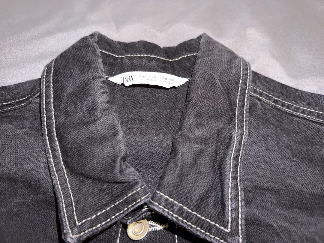 Zara Black Denim Jacket (Category: Coats, Jackets and Outerwear) located in Taguig. Submitted by j.lax. (Listing ID 1470330880, Image 2). Description: - Brand: Zara - Style: Denim jacket with contrast white stitching - Color: Washed black - Size: Medium.