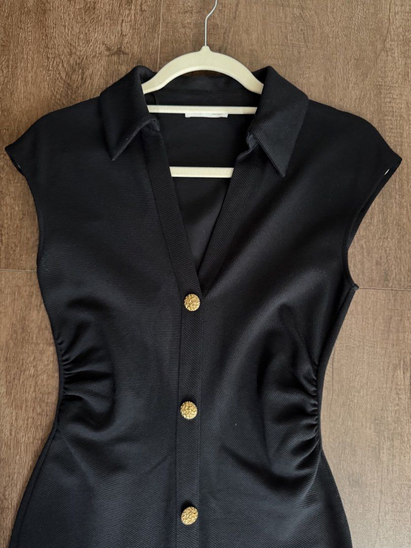 Zara Black Midi Dress Size S (Category: Dresses) located in Antipolo. Submitted by sugarpop.mnl (Listing ID 1470311267, Image 1). Description: - Brand: Zara - Size: EUR/USA S - Color: Black - Style: Collared V-neck midi dress with textured gold-tone front buttons - Fit: Flattering gathered ruching at the sides - Material: Textured fabric with slight stretch.