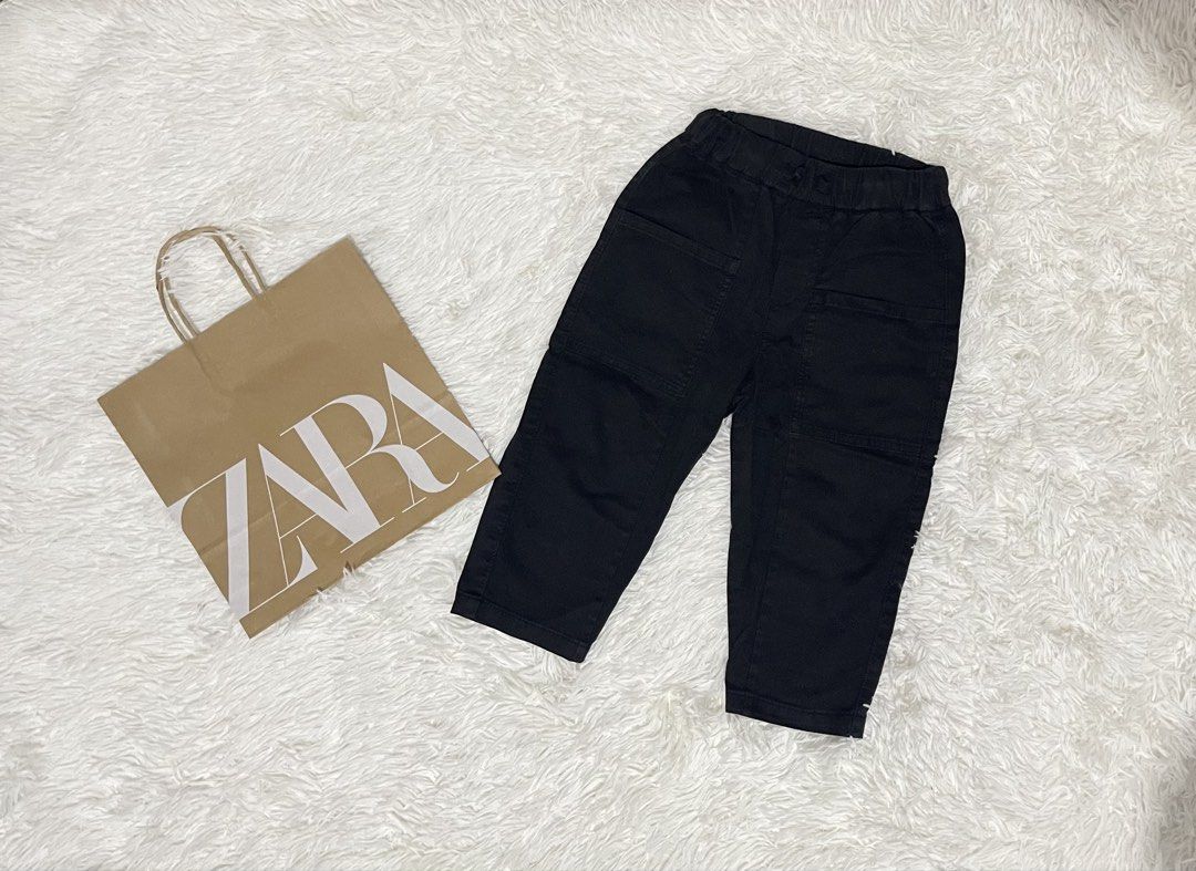 Zara black trouser square pocket pants (Category: Babies & Kids Fashion) located in Quezon City. Submitted by zntinycloset (Listing ID 1470291749, Image 1). Description: - Brand/Item: Zara Black Trousers - Size: 2-3 years (98 cm) - Waistband: Elastic with adjustable drawstring - Pockets: Front utility pockets and single back pocket - Condition: Excellent, clean, no stains or damage - Style: Easy pull-on style, great for everyday casual wear.