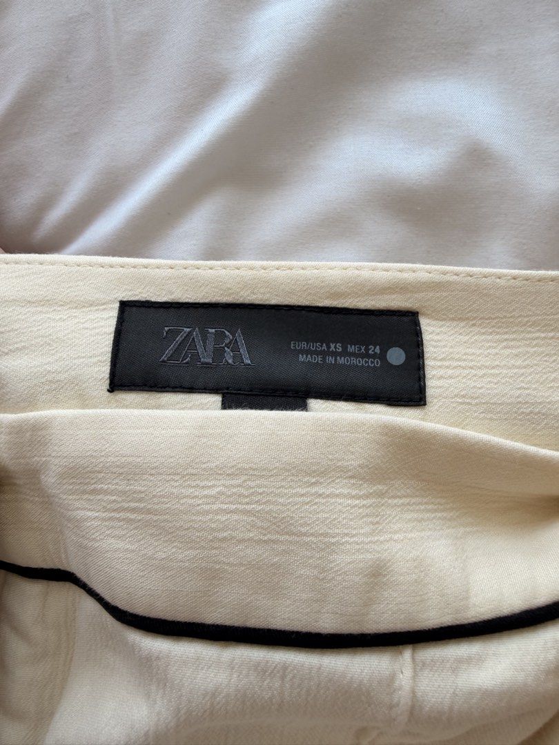 ZARA Cream Trousers Size XS (Category: Jeans) located in Makati City. Submitted by banshee1411 (Listing ID 1470259650, Image 3). Description: size 27.