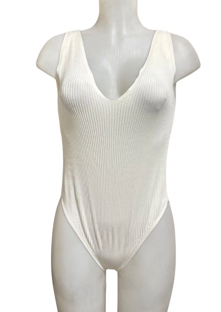 Zara Knit White Ribbed Bodysuit (Category: Sleeveless) located in Caloocan City. Submitted by shibowhii (Listing ID 1470233951, Image 1). Description: .