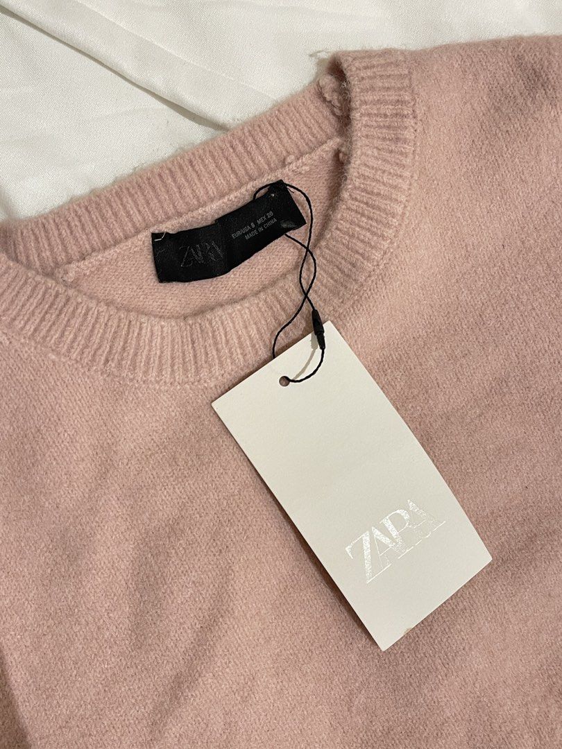 Zara Pink Ruffle Short-Sleeve Knit Top (Category: Blouses) located in Quezon City. Submitted by everythingmustgo__ (Listing ID 1470257949, Image 3). Description: Zara Pink Ruffle Short-Sleeve Knit Top - brand new with tags - size: small ‼️ firm with price. low ballers will not be entertained ‼️.