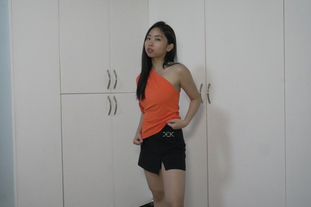 Zara One-Shoulder top + Bershka Skort (Category: Sleeveless) located in Manila. Submitted by danse.ph (Listing ID 1470239603, Image 2). Description: TOP: Worn: Once Size: S Color: Orange Price: 300 SKORT: Worn: Several times Size: XS Color: Black Price: 200 .