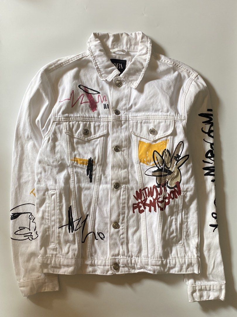 Zara White Printed Denim Jacket (Category: Coats, Jackets and Outerwear) located in Manila. Submitted by finofindthisart (Listing ID 1470256681, Image 2). Description: Length 25 Width 20 Measured it by inches Issue: N/A This is a pre-loved/thrifted items and may show minor signs of issue due to its vintage nature. Kindly manage expectations. No refunds or exchanges will be accepted. 📍Pasay City DM for inquiries..