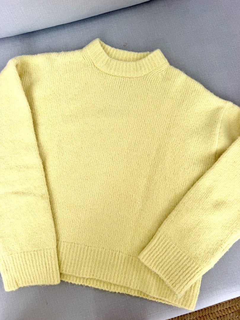 Zara Yellow Knit Sweater Medium (Category: Longsleeves) located in Lipa City. Submitted by pauline0303 (Listing ID 1470178888, Image 2). Description: - Brand: Zara - Size: EUR M / USA M - Color: Butter yellow - Material/Texture: Soft, fuzzy knit - Design: Crew neck with ribbed collar, cuffs, and hem - Origin: Made in China - Condition: Great staple piece for cooler weather, pairs easily with jeans.