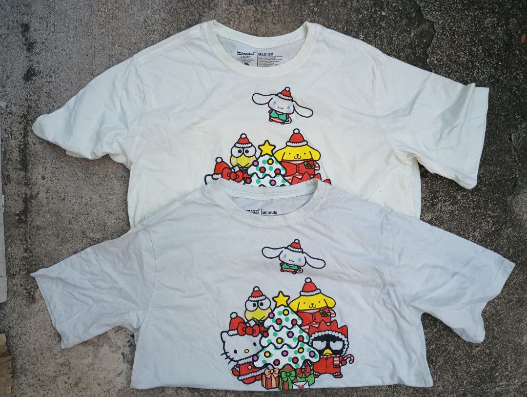 2 Hello Kitty Sanrio Tees (Category: Shirts) located in Las Pinas. Submitted by preloved_manila (Listing ID 1470435321, Image 1). Description: Official Sanrio Merch Medium.