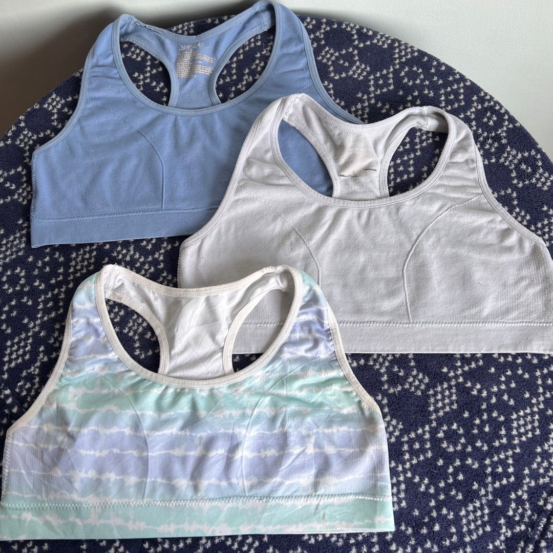 3 PCs Sports Bra bundle (Category: Activewear) located in Quezon City. Submitted by all_items_50_each (Listing ID 1470374499, Image 1). Description: 3 PCs Sports Bra bundle Fits kids- teens Without pad slots *brand and size is posted, as long as it is readable, measurements via tape measure-laid flat, is also posted *wash before wearing, may have lints, dirt/stains (due to storage), color-bleed stains, esp. light colored, with normal signs of usa