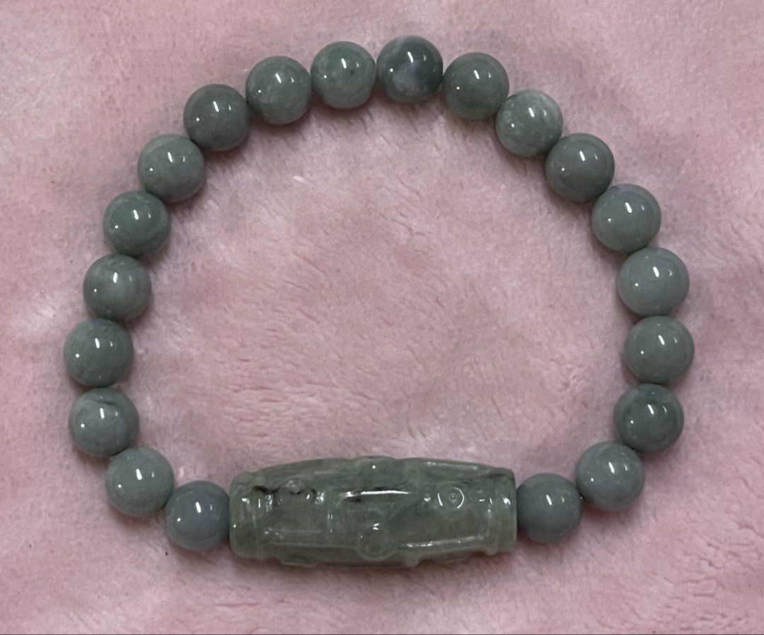 9-eye Dzi Blue Water Jadeite Bracelet (Category: Bracelets) located in Manila. Submitted by Crystal_Oracle (Listing ID 1470404699, Image 1). Description: Blue water jadeite is a rare, highly valued Guatemala variety prized for its tranquil, light blue-to-greenish, lake-like appearance and superior translucency. It acts as a powerful, calming talisman, enhancing emotional balance, reducing stress, promoting clear communication, and offering spirit