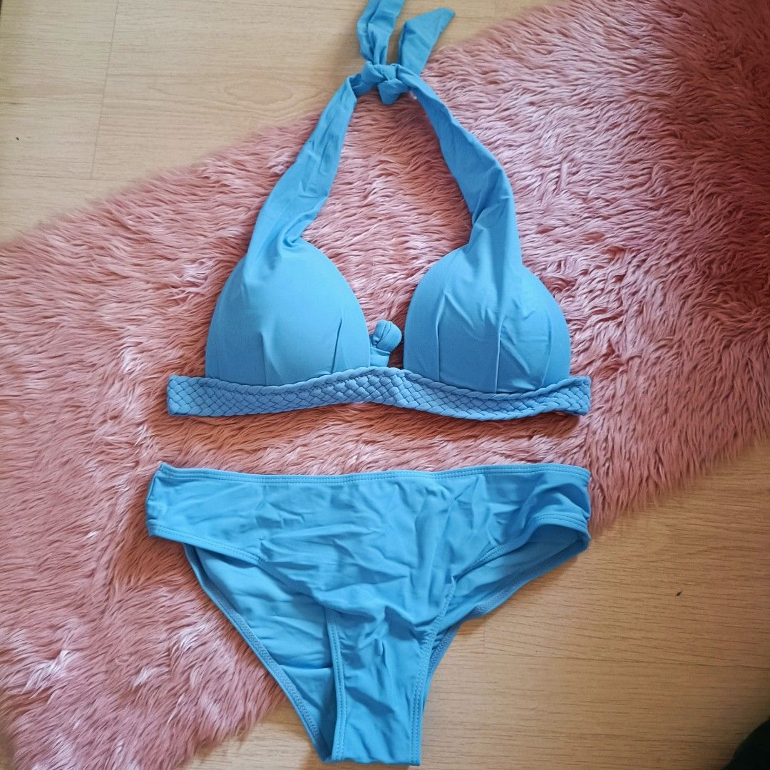 Ⓜ️ Blue Halter Neck Two-Piece Bikini Set (Category: Bikinis & Swimsuits) located in Bacoor. Submitted by Miss_Chuch0521 (Listing ID 1470363746, Image 1). Description: - Color: Vibrant bright blue - Style: Halter neck top with tie closure and matching low-rise bottoms - Details: Chic braided trim along the underbust band - Cups: Lightly padded and shaped for support - Condition: Clean, flawless, and ready for the beach or pool.