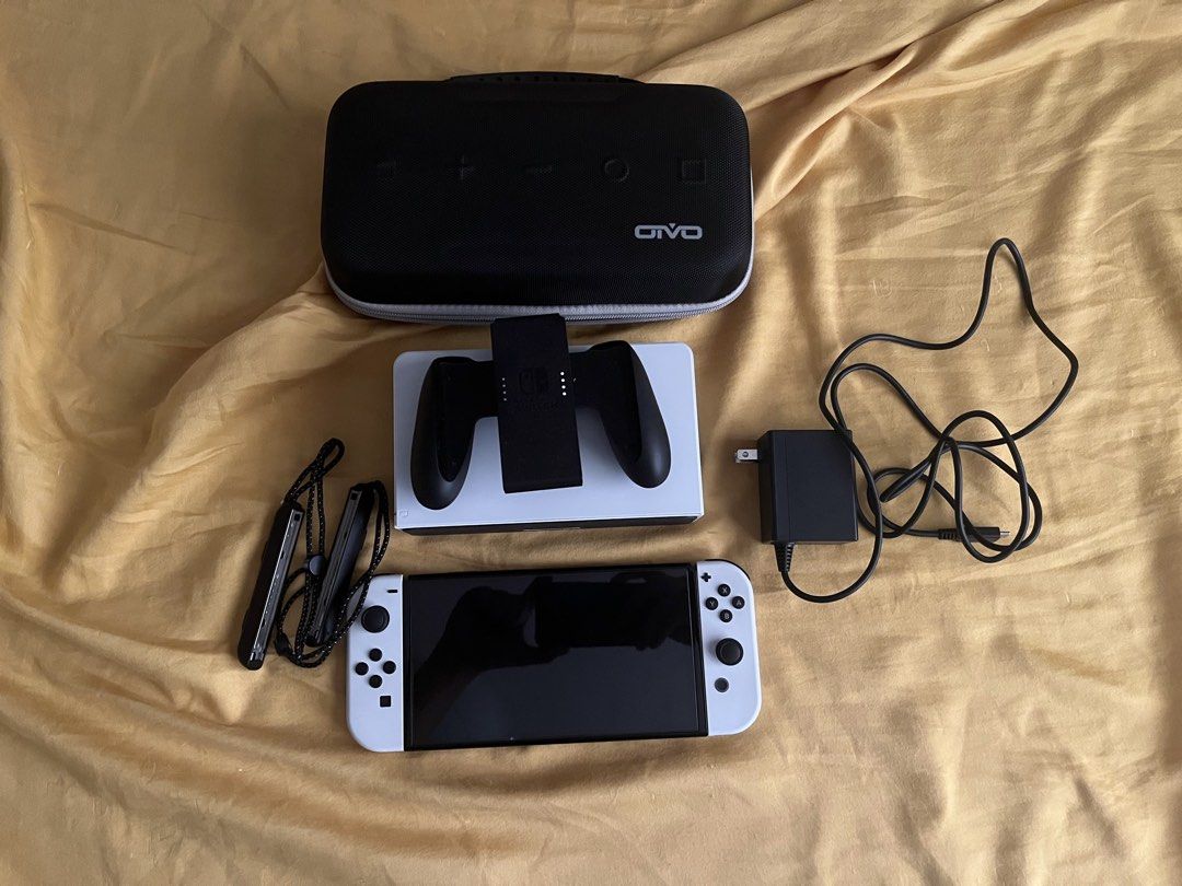 🎮 FOR SALE: NINTENDO SWITCH OLED BUNDLE + GAMES (Category: Nintendo) located in Paranaque City. Submitted by riri_133 (Listing ID 1470377952, Image 3). Description: 📌 All items were originally purchased from DataBlitz at their original retail prices. Nintendo Switch OLED Bundle – ₱18,000 Includes: • Nintendo Switch OLED Console • SD Card • Carrying Case • 2 pcs. Racing Wheel Controllers • Original box and accessories Condition: Well cared for a