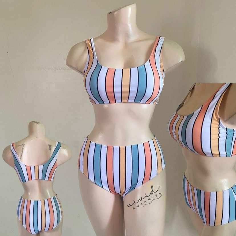 Ⓜ️ Striped High-Waist Bikini Set (Category: Bikinis & Swimsuits) located in Bacoor. Submitted by Miss_Chuch0521 (Listing ID 1470365719, Image 2). Description: Design: Fun vertical stripe pattern in vibrant orange, turquoise, white, and yellow - Top: Scoop neck with supportive thick straps - Bottoms: High-waisted style with flattering moderate coverage - Perfect for: Beach trips, pool days, and tropical getaways - Condition: Brand new / Excellent.