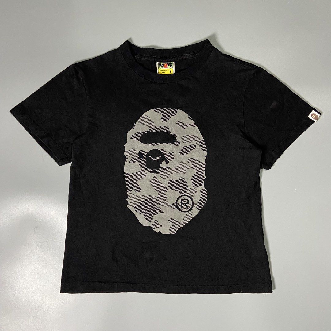 A Bathing Ape (BAPE) Big Ape Head Camo Tee (Category: Tshirts & Polo Shirts ) located in Taguig. Submitted by workwearheads (Listing ID 1470363971, Image 1). Description: ▪️Width: 18 ▪️Length: 21 ▪️Color Rate: 10/10 ▪️No issue ▪️Excellent Condition .