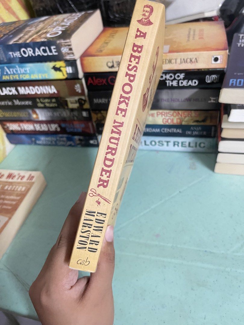 A Bespoke Murder - Edward Marston (Category: Storybooks) located in General Trias. Submitted by kwinay.28 (Listing ID 1470467940, Image 2). Description: Preloved book with spine crease and stained edges. Historical Mystery / Historical Crime Fiction Police Procedural World War I Fiction.
