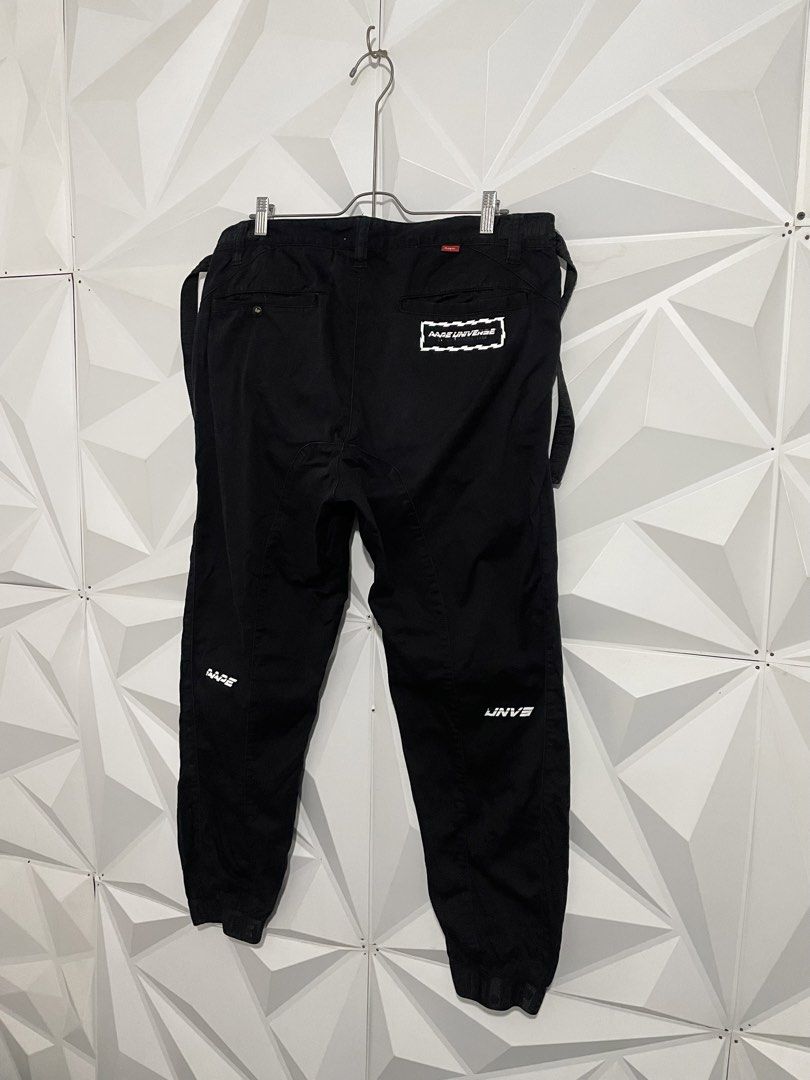 Aape By A Bathing Ape Black Cargo Jogger Pants (Category: Joggers) located in Cabuyao City. Submitted by ParadisethriftedPh (Listing ID 1470547165, Image 3). Description: Issue yung iba paints nabura na Cr : 9/10 Dimensions W: 36-38 L: 39 - Brand: Aape by A Bathing Ape - Color: Solid black - Condition: Great overall - Style: Streetwear cargo joggers - Features: Side utility straps and elastic cuffs - Details: Printed graphics on front pocket and 