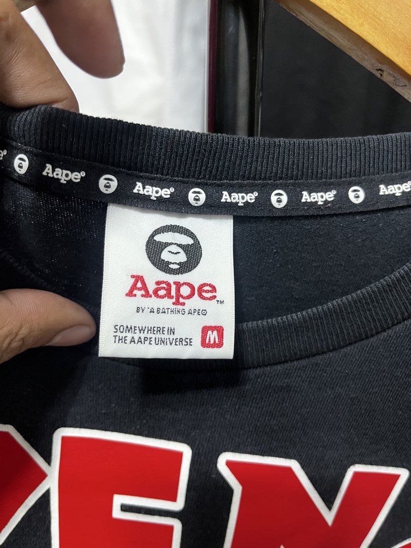 AAPE By A Bathing Ape Fire Graphic Black Tee (Category: Tshirts & Polo Shirts ) located in Cabuyao City. Submitted by undergroundthrift03 (Listing ID 1470521440, Image 2). Description: Brand: Aape Dimes: 20 X 27 Colorate: 9.8/10 Condition: 9.8/10 Issue: None Mode of payment: Gcash (Pay now ship now) Mode of shipping: J&t Location: Cabuyao, Laguna.