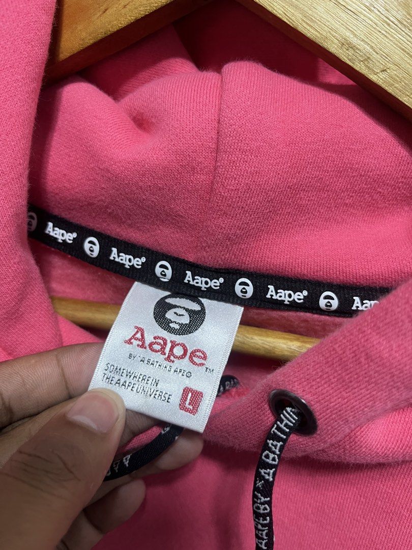 AAPE By A Bathing Ape Pink Hoodie (Category: Coats, Jackets and Outerwear) located in Cabuyao City. Submitted by undergroundthrift03 (Listing ID 1470517401, Image 3). Description: AAPE PINK HOODIE JACKET Brand: Aape Dimes: 21 X 26 Colorate: 9.5/10 Condition: 9.5/10 Issue: None Mode of payment: Gcash (Pay now ship now) Mode of shipping: J&t Location: Cabuyao, Laguna.
