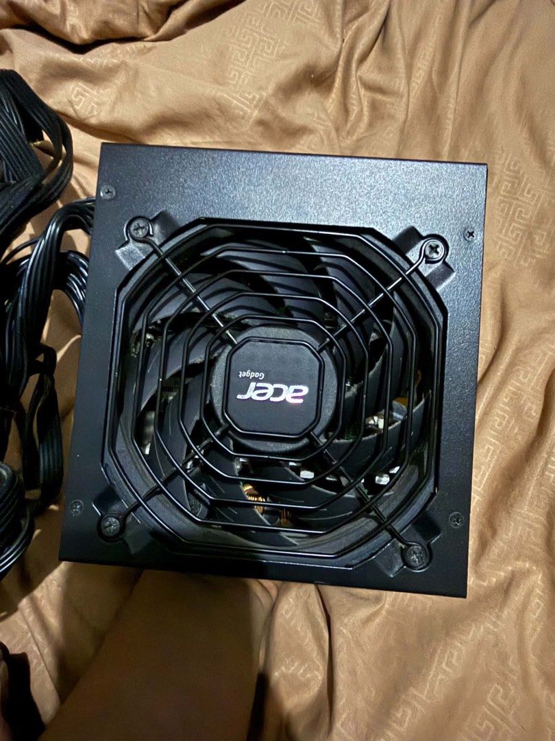 Acer AC650 Full Modular Power Supply (Category: Computer Parts) located in Quezon City. Submitted by aceyz (Listing ID 1470516415, Image 2). Description: - Brand/Model: Acer eMachines AC650 - Power Output: 650W with 80+ Bronze efficiency - Form Factor: Standard ATX (140x150x85mm) - Safety Features: OVP, SCP, UVP, and OPP protection - Cooling: Integrated silent bottom fan - Cabling: Full modular with neat black cables - Good condition - Nego basta