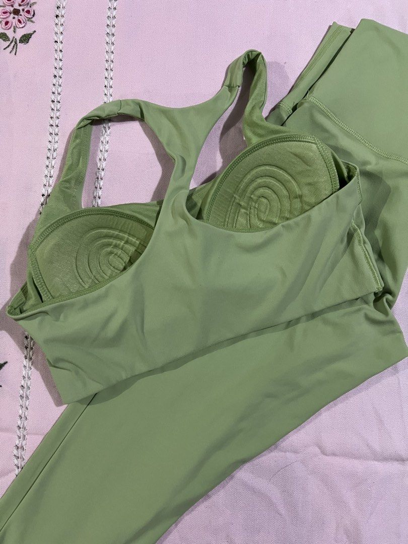 Activewear set (Category: Activewear) located in Marikina City. Submitted by tintinarenas (Listing ID 1470452702, Image 3). Description: - Set includes: 1 racerback sports bra with built-in contoured pads and matching bottoms - Color: avocado green - Condition: Excellent / gently used - Features: Soft, breathable, stretchable fabric ideal for workouts, yoga, or casual wear - Design: Flattering fit with supportive straps and comfortable waistband 