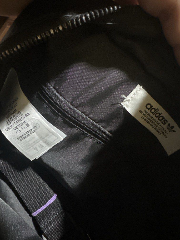 Adidas 2-way bag (Category: Cross-body Bags) located in Marikina City. Submitted by prelovedmla (Listing ID 1470451929, Image 3). Description: Like new Adidas black sling/backpack bag. Can fit up to pro max phones, wallet and small stuff. .
