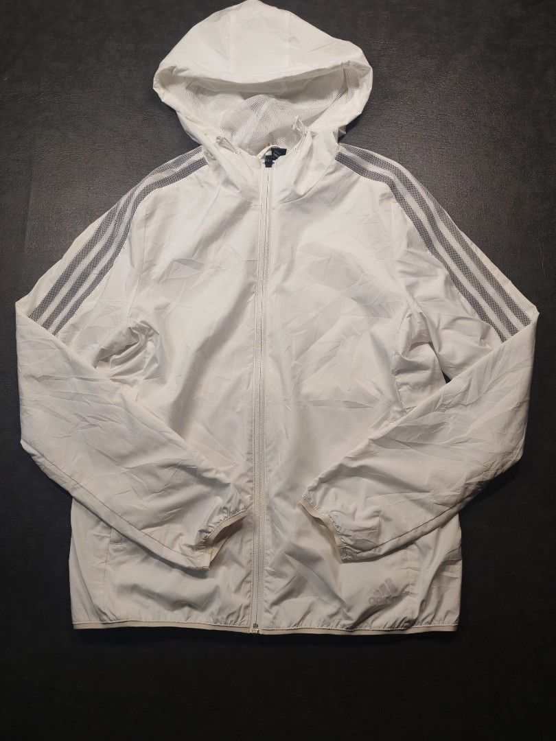 Adidas 3-Stripes Woven Windbreaker Jacket (Category: Coats, Jackets and Outerwear) located in Kalibo. Submitted by relivethearchives (Listing ID 1470445739, Image 1). Description: Adidas 3-Stripes Woven Windbreaker Jacket in Excellent Condition Size Medium on tag DIMES Width: 18 Length: 24.