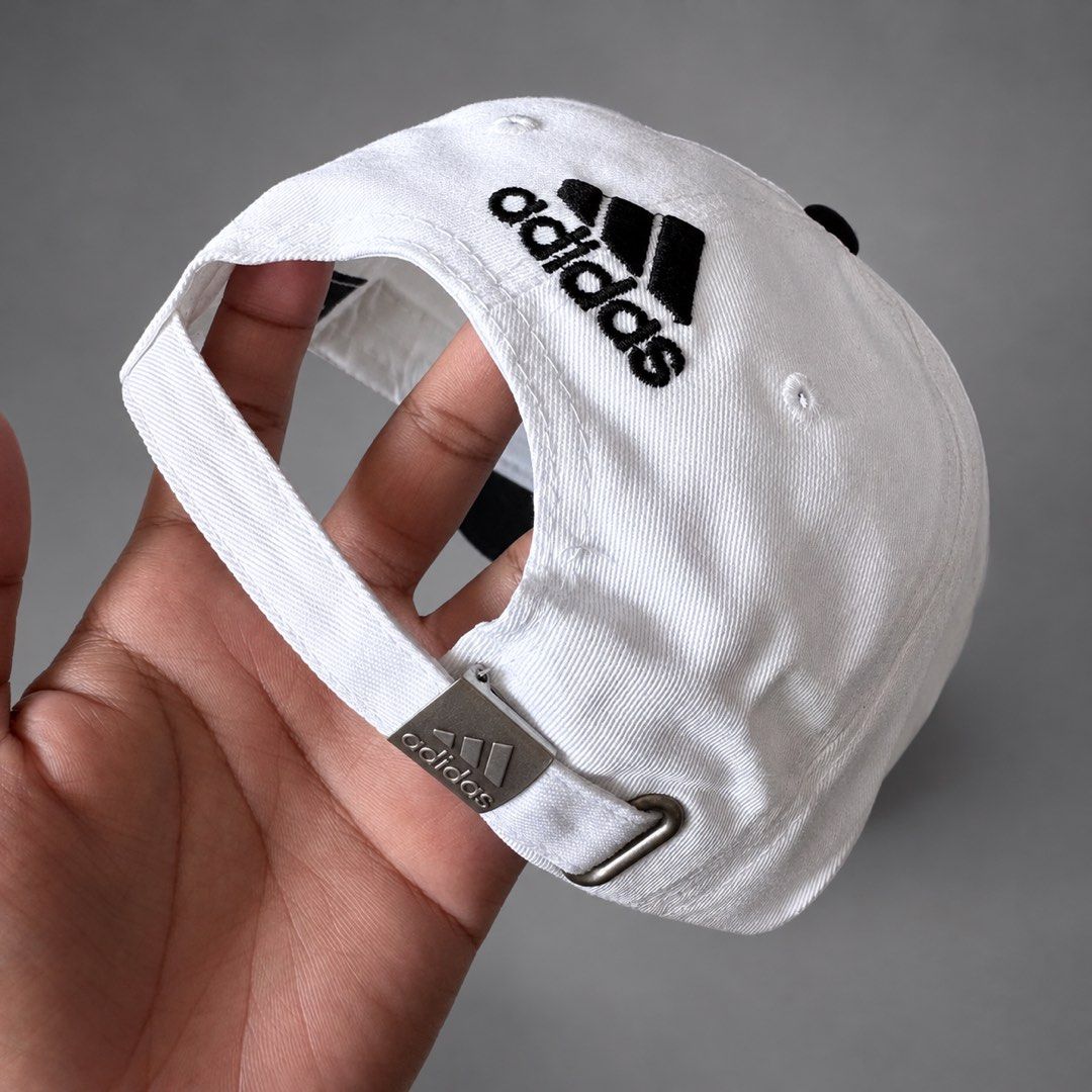 ADIDAS BUCKLE BASEBALL CAP (Category: Caps & Hats) located in Taguig. Submitted by clarrk95 (Listing ID 1470423880, Image 3). Description: Adidas Buckle Baseball Cap PRICE: ₱150 ONLY! FLAWS: minor dirt & stain Stocked in closet ✅ brandnew ✅ add shipping fee ✅ ignoring LP inquiry Shipping: Lalamove | J&T | LBC Location: Taguig📍 Payment: Gcash | Bank | Cash FB: THRFT IG: thrft_25 DM for more detailed pics.📩.