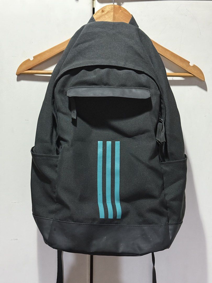 Adidas Classic Backpack (Category: Backpacks) located in Quezon City. Submitted by itsbiancag (Listing ID 1470446863, Image 1). Description: - Adidas Classic Backpack (DM7672) featuring bright turquoise/teal vertical stripes down the front. - Unisex. Great for school, gym or daily commute. - No flaws, not worn out.