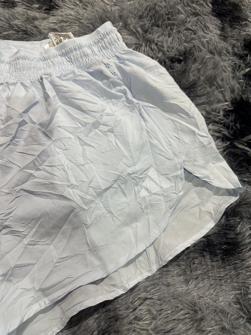Adidas Climacool Light Blue Running Shorts Size S (Category: Shorts) located in Iba. Submitted by thriftcoyan (Listing ID 1470486280, Image 2). Description: - Brand: Adidas Climacool - Color: Light Blue - Size: Small (Regular fit) - Waistband: Elastic with secure back zippered pocket - Design: Curved hem with split sides for maximum mobility - Fabric: Lightweight material, ideal for workouts and daily runs - Good as new.