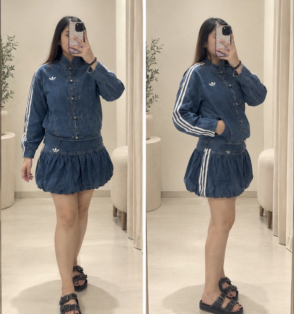 Adidas Denim Track Jacket and Bubble Skirt Set (Category: Sets or Coordinates) located in Bulacan. Submitted by ccapz19 (Listing ID 1470349747, Image 2). Description: - BKK matching Adidas dark denim set - Includes a zip-up track jacket with unique Chinese knot buttons - Comes with a stylish bubble hem skirt featuring 3-stripes down the side - Signature white trefoil logo on both top and bottom - Perfect statement piece for a trendy street style 