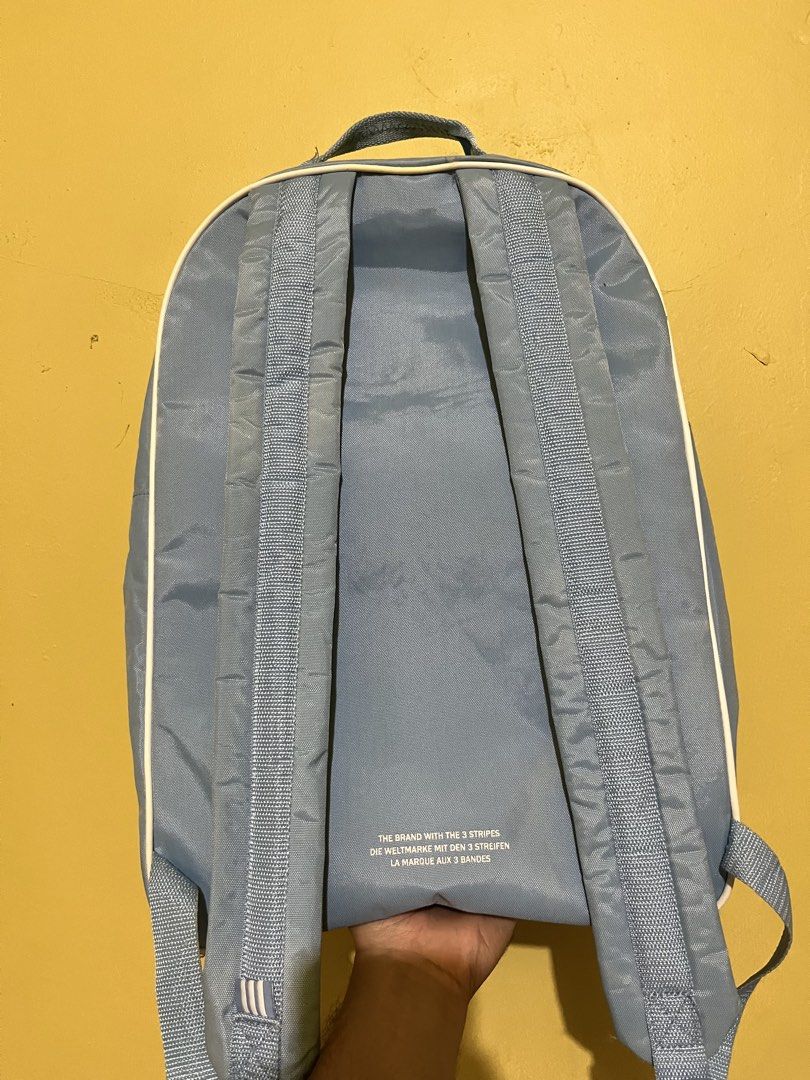 Adidas light blue Adicolor Backpack (Category: Backpacks) located in Bacolod City. Submitted by jem111111 (Listing ID 1470450321, Image 2). Description: GOOD AS NEW NEED LIGHT WASH ON BACK FRONT SIDE NO FLAWS NO CRACKPRINTS ALL ZIPS WORKING CAN FIT LAPTOP, BOOKS, ETC. ORIGINAL SEARCHABLE CODE.