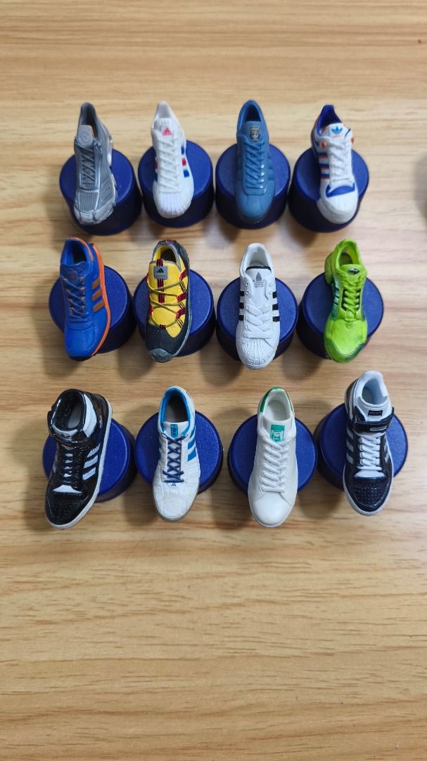 Adidas miniature sneaker Pepsi collection figures (Category: Figurines & Statues) located in Santa Rosa. Submitted by tinytoycrate (Listing ID 1470458544, Image 1). Description: ⭐ 100 Each ⭐ 1300 Take all ⭐ Good condition ⭐ What you see is what you get - Collection of tiny Adidas sneaker figurines resting on bottle caps - Includes iconic designs like Superstar and Stan Smith in multiple colorways - Highly detailed miniatures featuring visible lac