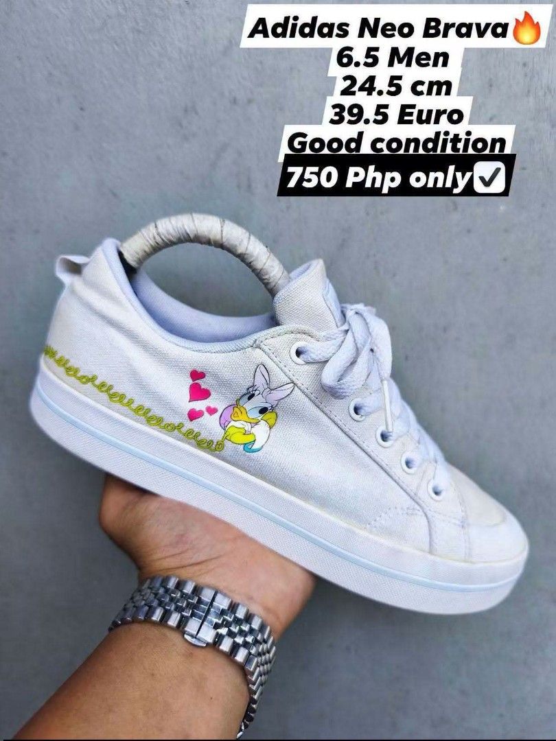 Adidas Neo Brava Shoes (Category: Sneakers) located in Manila. Submitted by thrifter12345 (Listing ID 1470476911, Image 1). Description: - Brand: Adidas Neo Brava - Color: White canvas - Size: Men's 6.5 | 24.5 cm | 39.5 Euro - Design: Cute Daisy Duck graphic with pink hearts and stitched trim - Style: Classic lace-up with white laces and chunky sole - Condition: Good overall, clean and ready to wear.