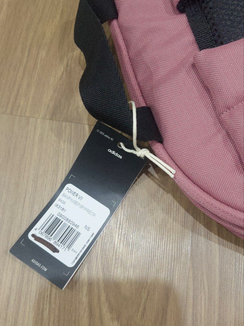 Adidas Power VII Backpack Pink Black IX3181 (Category: Backpacks) located in Manila. Submitted by extras_bym (Listing ID 1470443194, Image 3). Description: - Brand: Adidas Power VII Backpack (Model: IX3181) - Color: Pink and black - Condition: Brand new with original tag attached - Storage: Multiple compartments and convenient side slip pockets - Comfort: Adjustable shoulder straps with mesh padding - Design: Bold three-stripe branding on the fro
