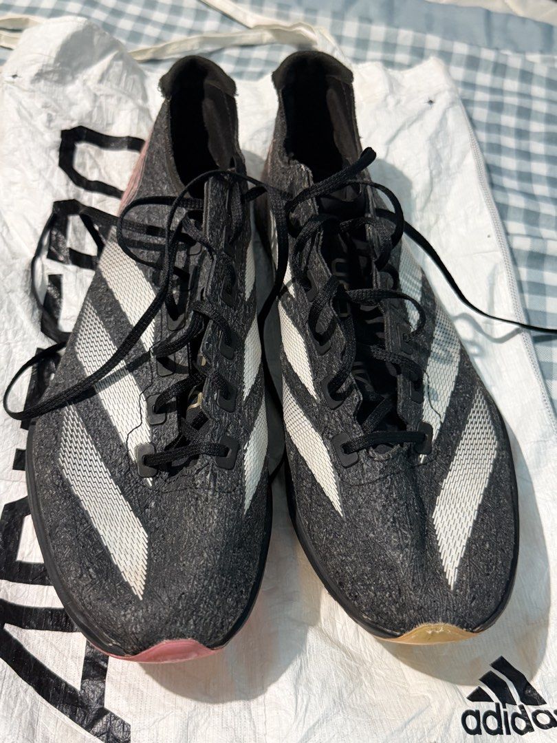 Adidas Running Shoes Black White (Category: Sneakers) located in Manila. Submitted by anddrei26 (Listing ID 1470545011, Image 1). Description: Adizero Prime Sp3 Strung Rarely Use Only 10 times before my injury Size 8 .
