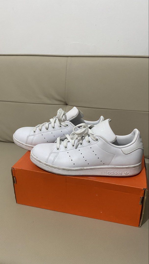 Adidas Stan Smith White Sneakers Size US 5 (Category: Sneakers) located in Makati City. Submitted by ontrend.withabi (Listing ID 1470417781, Image 3). Description: - Brand: Adidas Stan Smith - Color: Classic White - Size: US 5 / UK 4.5 / FR 37.5 (Regular Fit) - Style: Iconic low-top tennis shoe with perforated three stripes - Material: Clean leather upper with white laces - Details: Signature branding on the tongue and heel tab - No box RFS: di n