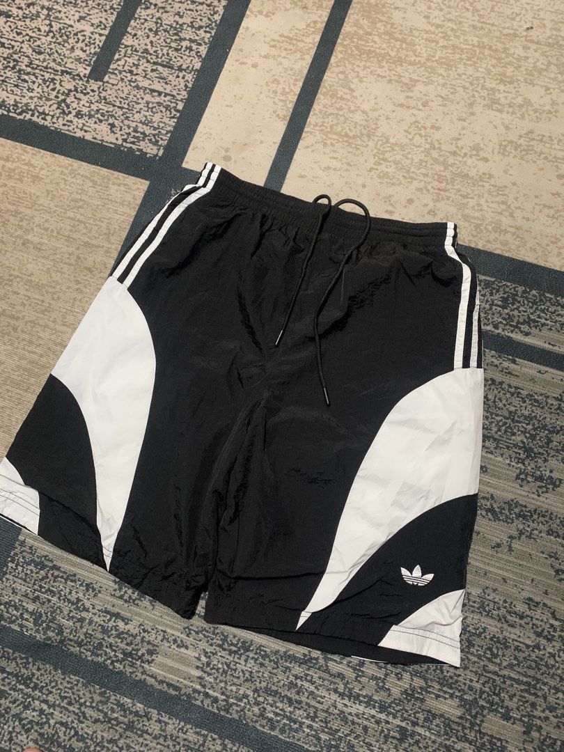 Adidas woven (Category: Shorts) located in Cebu City. Submitted by thriftsh1t.ph (Listing ID 1470500743, Image 2). Description: W28-34 stretched Adjustable L20.