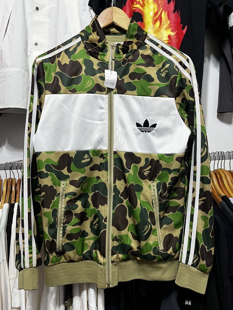 Adidas x A Bathing Ape Firebird Bape Track Jacket (Category: Coats, Jackets and Outerwear) located in Cabuyao City. Submitted by undergroundthrift03 (Listing ID 1470522634, Image 1). Description: Brand: Bape Dimes: 20 X 26.5 Colorate: 9.8/10 Condition: 9.8/10 Issue: None Mode of payment: Gcash (Pay now ship now) Mode of shipping: J&t Location: Cabuyao, Laguna.