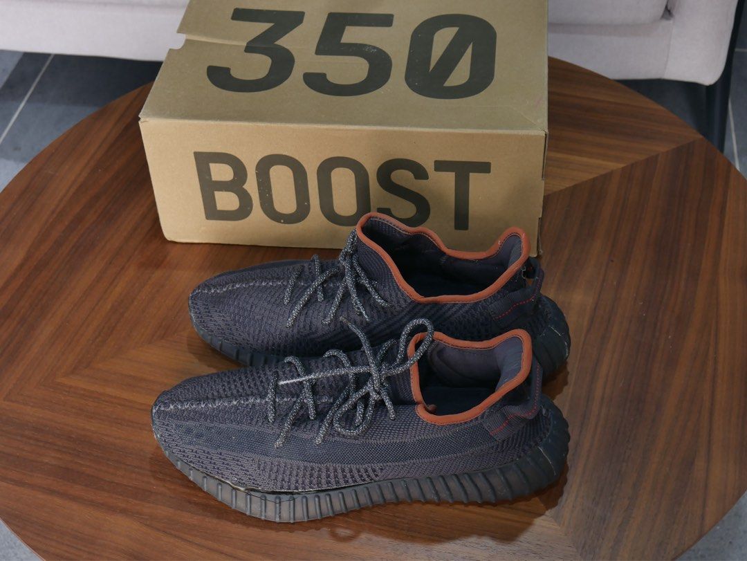 Adidas Yeezy Boost 350 V2 Black Reflective (Category: Sneakers) located in Manila. Submitted by noblehawk_6e6525 (Listing ID 1470446809, Image 3). Description: SLIGHTLY NEGOTIABLE - Brand: Adidas Yeezy Boost 350 V2 - Color: Black - Size: US 12.5 - Condition: Worn a few times, clean soles with minimal wear on treads, minor issues but can be fixed with glue. - Features: Distinct knit pattern, reflective laces, and contrast collar trim - Inclusions:
