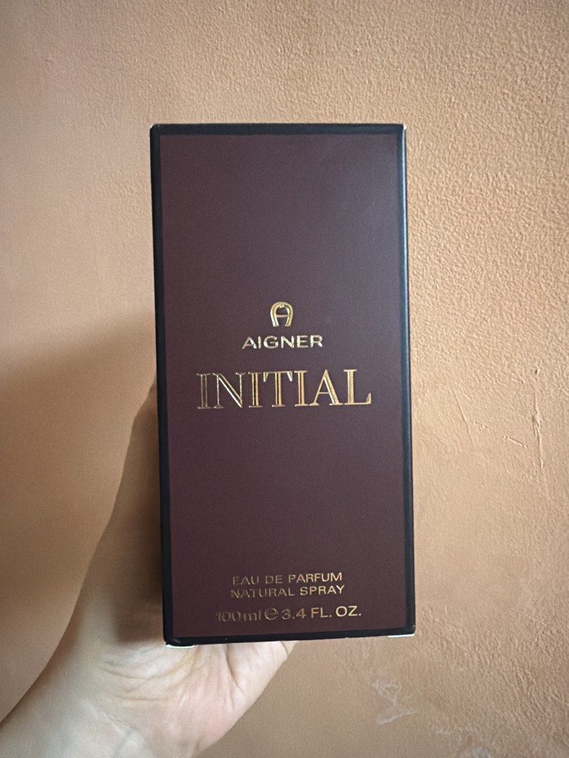 Aigner Initial Eau De Parfum 100ml (Category: Fragrance & Deodorants) located in Iligan City. Submitted by ceyshop11 (Listing ID 1470370379, Image 1). Description: - Brand: Aigner - Fragrance: Initial Eau de Parfum - Volume: 100ml natural spray - Condition: est. 3-5 sprays used, original packaging - Packaging: Elegant deep brown box with gold lettering - 100% authentic and ready to ship.