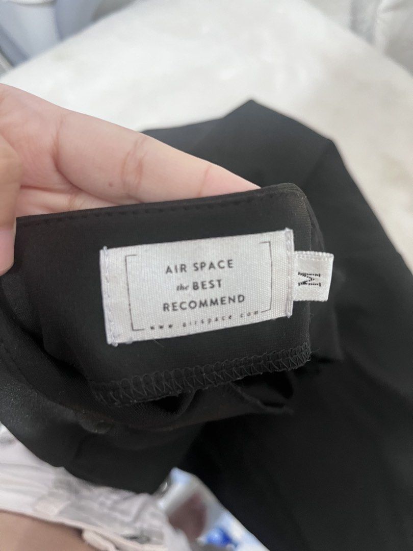 Air Space Black Midi Skirt Size M (Category: Skirts) located in Manila. Submitted by clandistine (Listing ID 1470355503, Image 2). Description: - Brand: Air Space - Size: M - Color: Black - Condition: Worn once, excellent shape - Details: High waist, back zipper closure, unique strap cutout near the front slit .